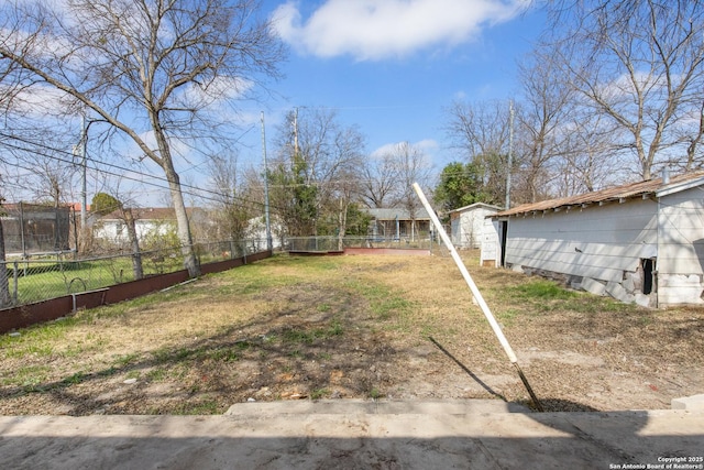 view of yard with a trampoline