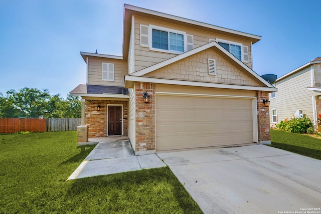 view of front of house with a garage and a front yard