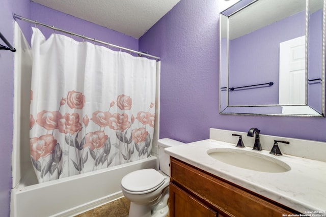 full bathroom featuring vanity, shower / bath combo, toilet, and a textured ceiling