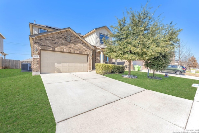 view of front facade with a garage and a front lawn