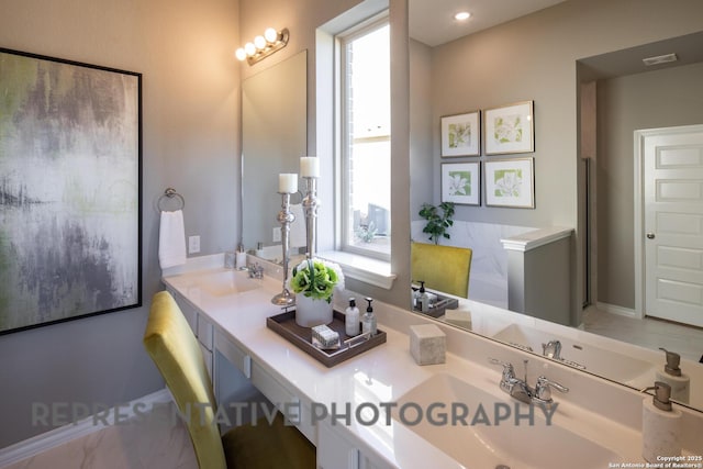 bathroom featuring vanity