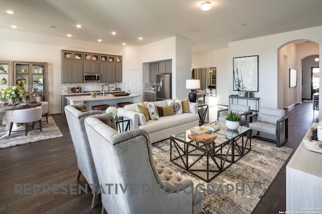 living room with dark hardwood / wood-style floors