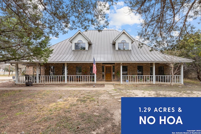 farmhouse inspired home with a porch