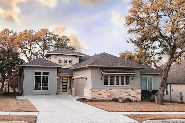 prairie-style home with a garage