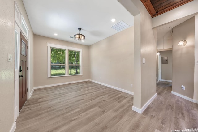 spare room featuring light hardwood / wood-style floors