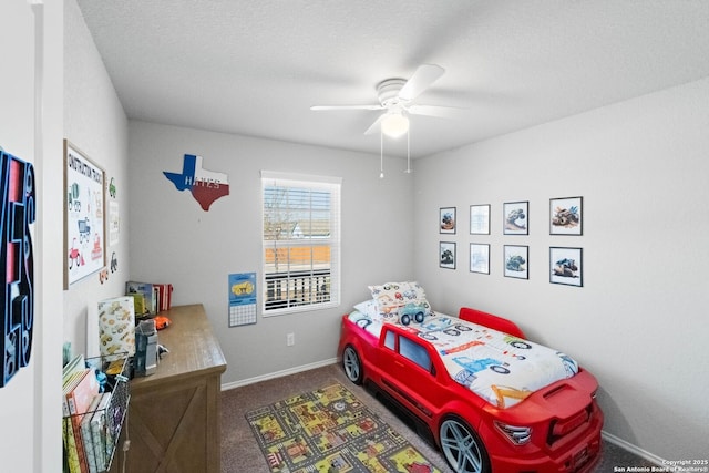 bedroom featuring ceiling fan and carpet flooring