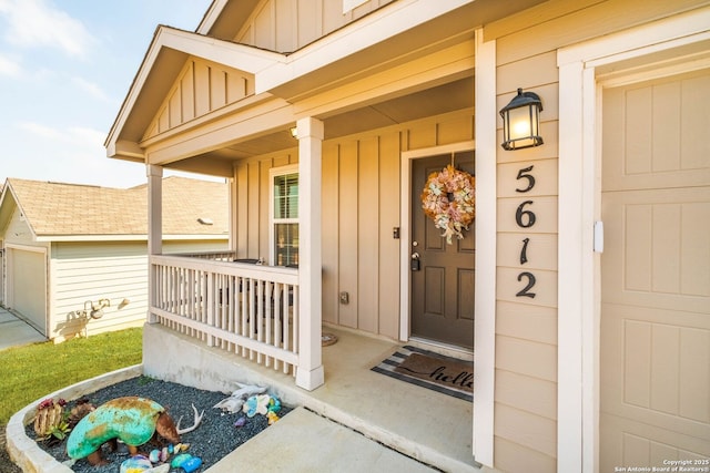 property entrance featuring covered porch