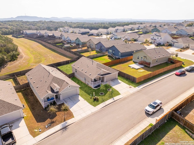 birds eye view of property featuring a mountain view