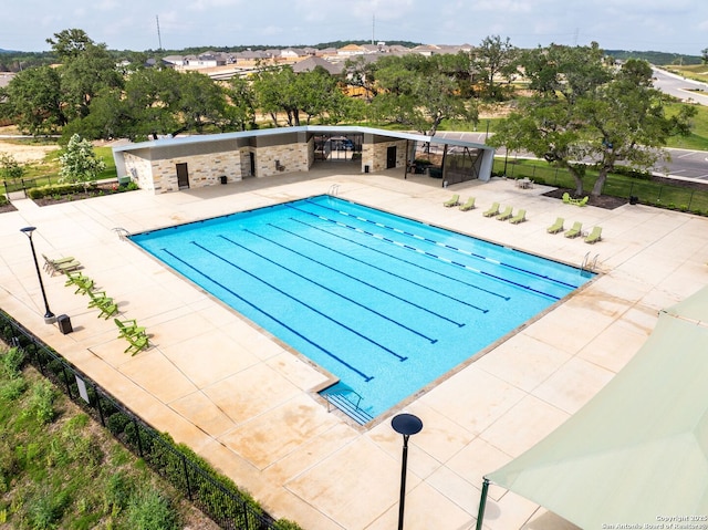 view of pool featuring a patio