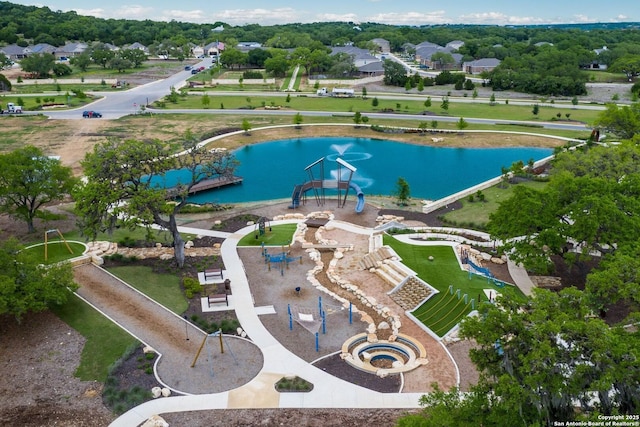 bird's eye view with a water view