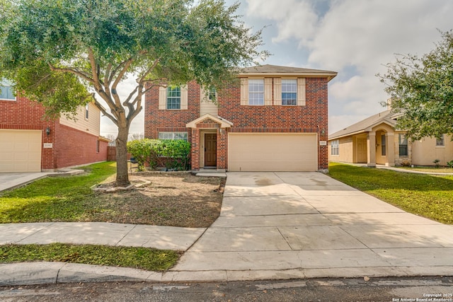 view of front of property featuring a garage and a front lawn