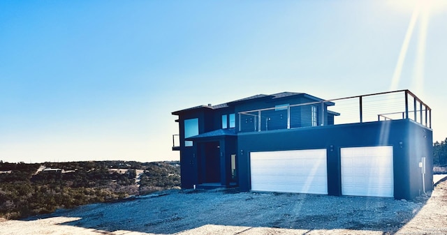 view of front of property featuring a garage