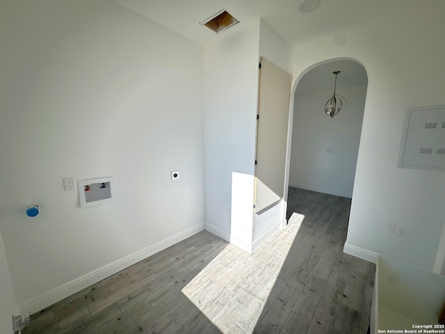 laundry area with hookup for a washing machine, dark hardwood / wood-style floors, and hookup for an electric dryer