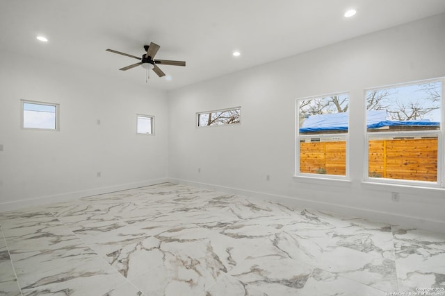 unfurnished room with plenty of natural light and ceiling fan