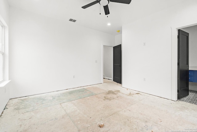 unfurnished room with ceiling fan