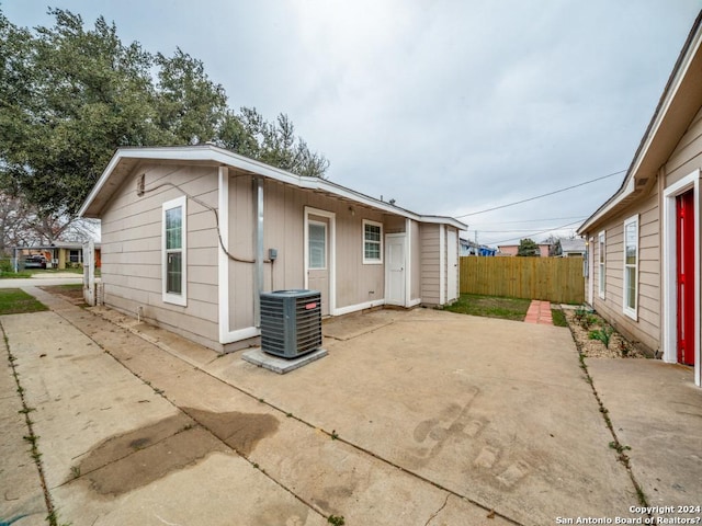 exterior space featuring central AC and a patio