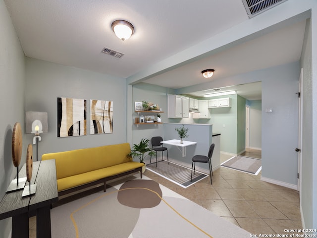 living room featuring light tile patterned floors