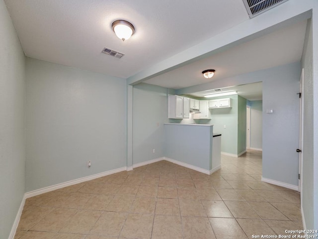 view of tiled spare room