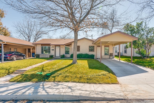 ranch-style home with a carport and a front yard