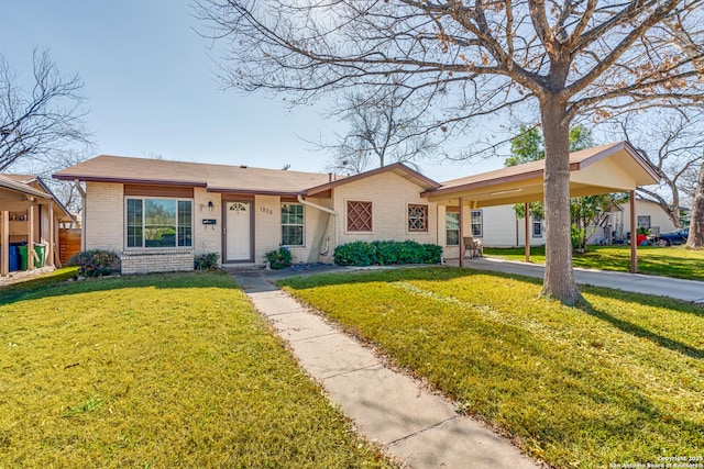 ranch-style home featuring a front yard and a carport