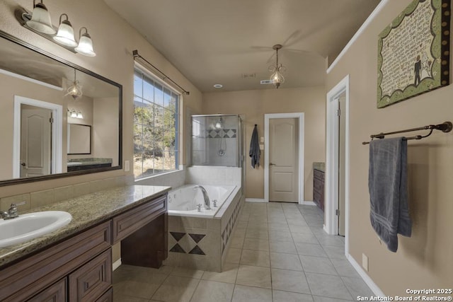 bathroom with tile patterned flooring, vanity, and plus walk in shower