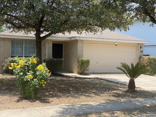 ranch-style home with a garage