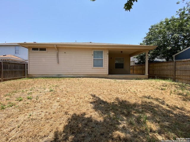 rear view of house with a patio area