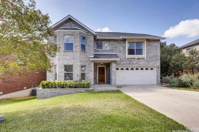 view of front of house featuring a garage and a front yard