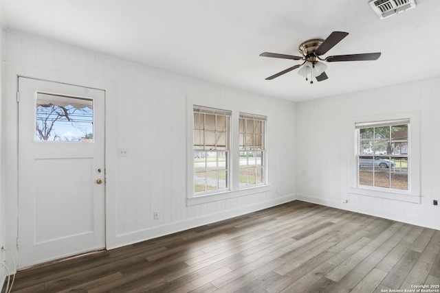 foyer entrance with hardwood / wood-style flooring and ceiling fan