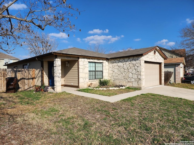 ranch-style home with a garage and a front yard