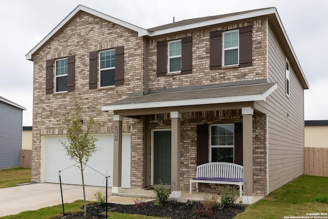 view of front facade featuring a garage and a porch