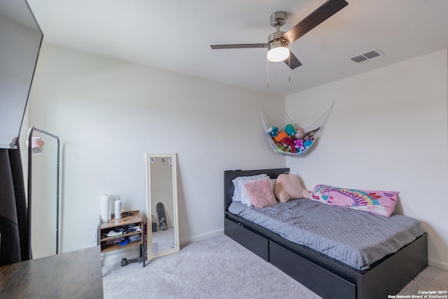 carpeted bedroom featuring ceiling fan