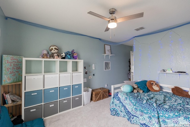 carpeted bedroom with ceiling fan