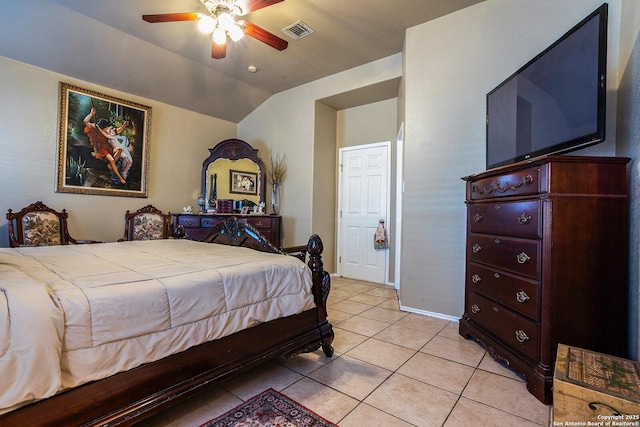 bedroom with ceiling fan, lofted ceiling, and light tile patterned floors