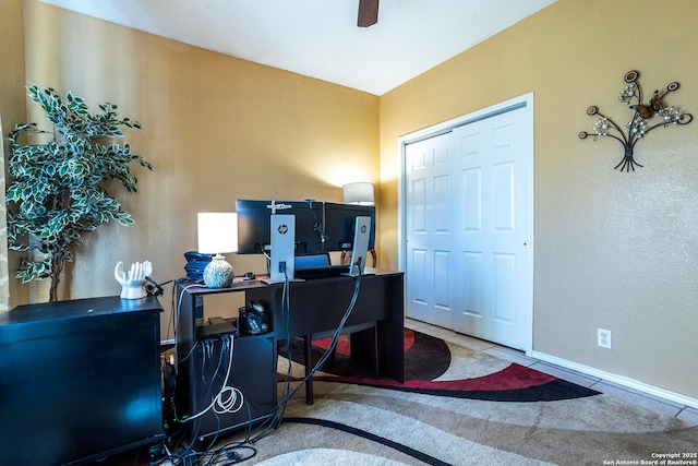 tiled home office with ceiling fan