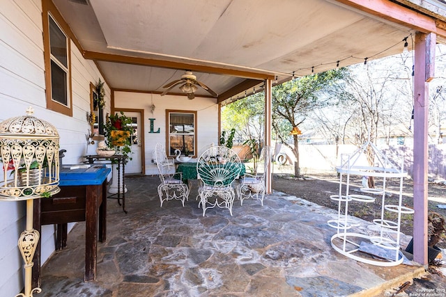 view of patio / terrace featuring ceiling fan