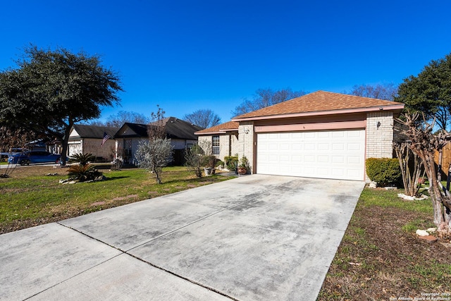 single story home with a garage and a front yard