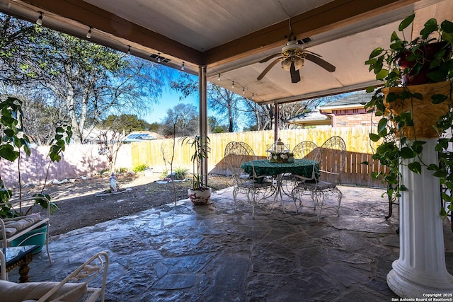 view of patio with ceiling fan