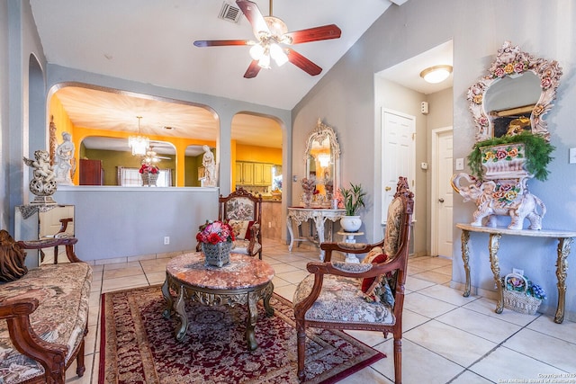 living area featuring light tile patterned flooring and ceiling fan