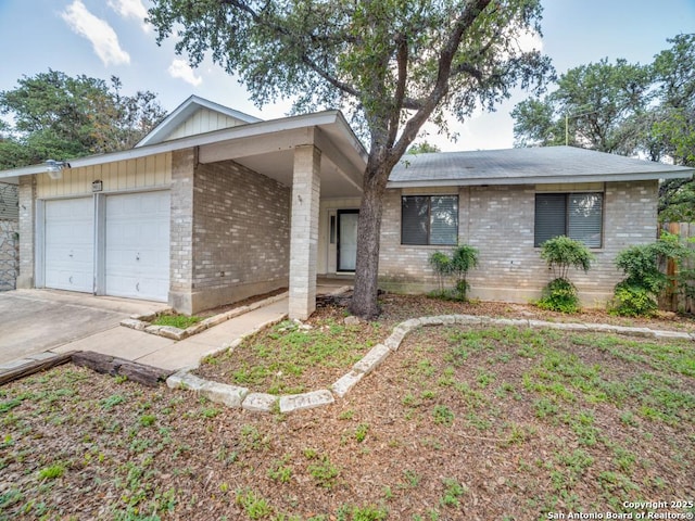 ranch-style house featuring a garage