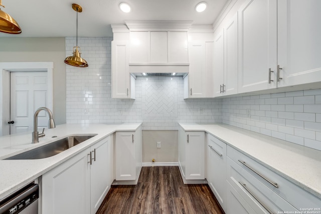 kitchen with white cabinetry, dishwasher, and hanging light fixtures