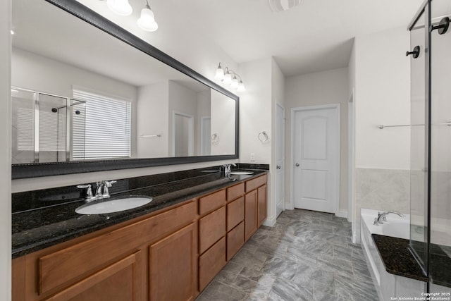 bathroom with independent shower and bath and vanity