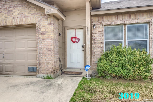 entrance to property with a garage