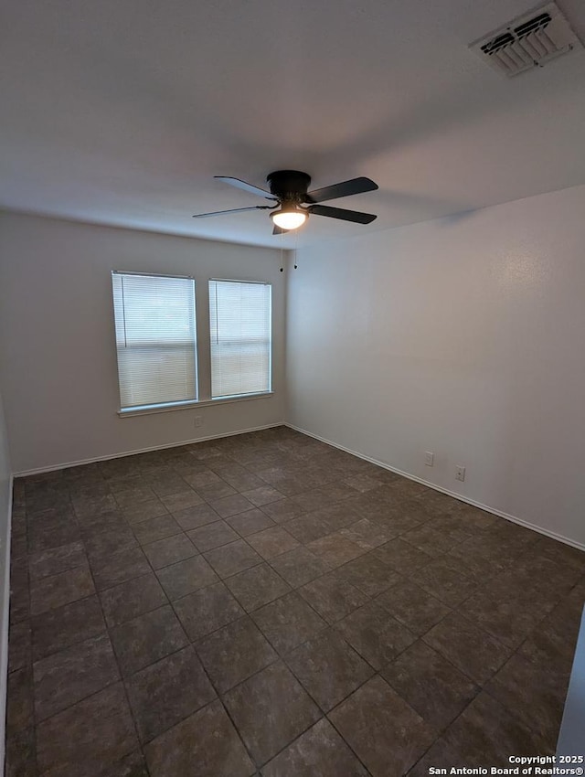 empty room with ceiling fan