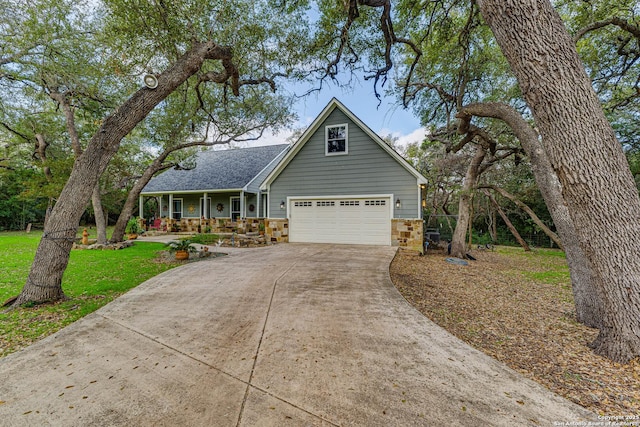 view of front of house with a garage and covered porch