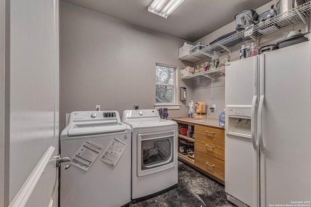 laundry area with washer and dryer