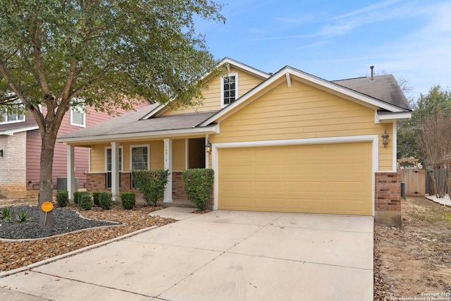 craftsman-style home featuring a garage and a porch