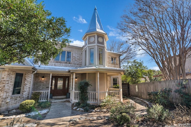 victorian home featuring a porch