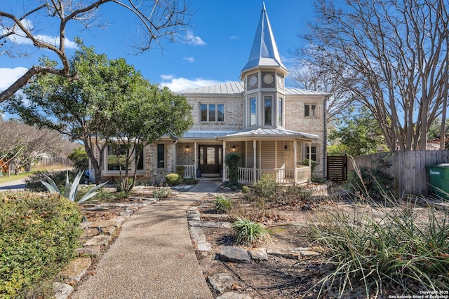 victorian home featuring covered porch