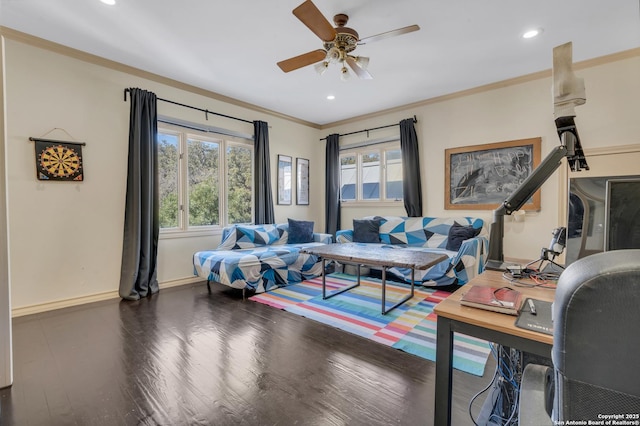 bedroom with crown molding, dark wood-type flooring, and ceiling fan